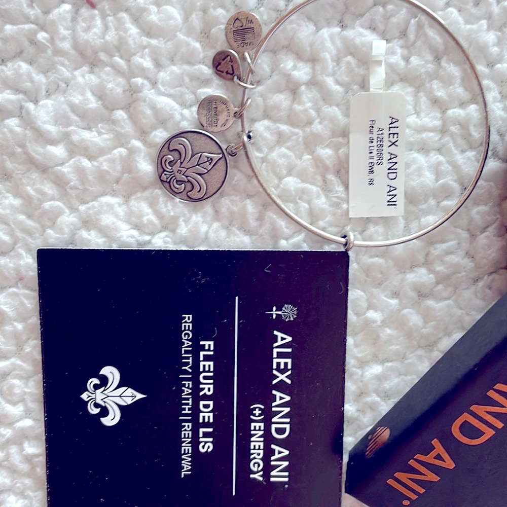 Alex and Ani Fleur De Lis bracelet with original box and tags.
